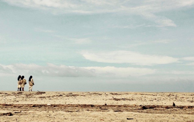 Young Kogi men at the beach of Palomino